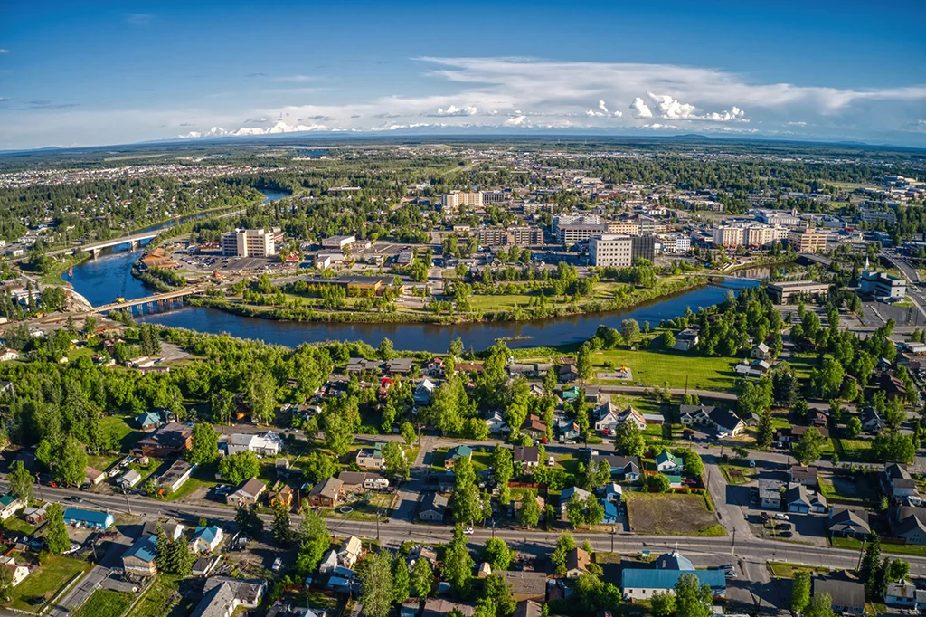 Aerial view of Fairbanks, Alaska. Focus on commercial buildings that can be serviced for plumbing, heating and piping by Living Waters LLC